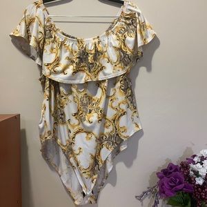 White and gold bodysuit